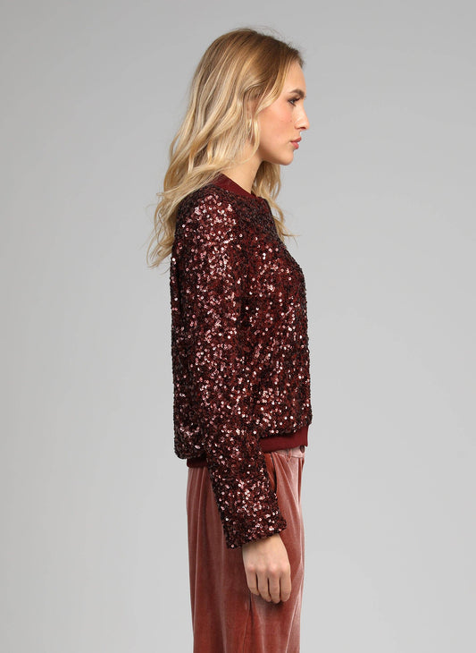 Blouson con paillettes color vino