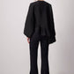 Blusa nera con balza asimmetrica