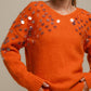 Maglione in maglia con paillettes sulle maniche
