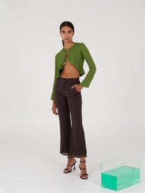 Blusa corta verde con fiocchi e volant