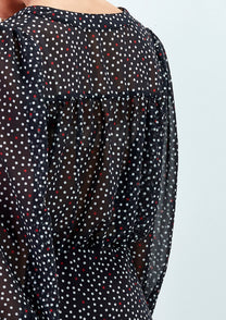 Blusa a pois con scollo a V e maniche morbide