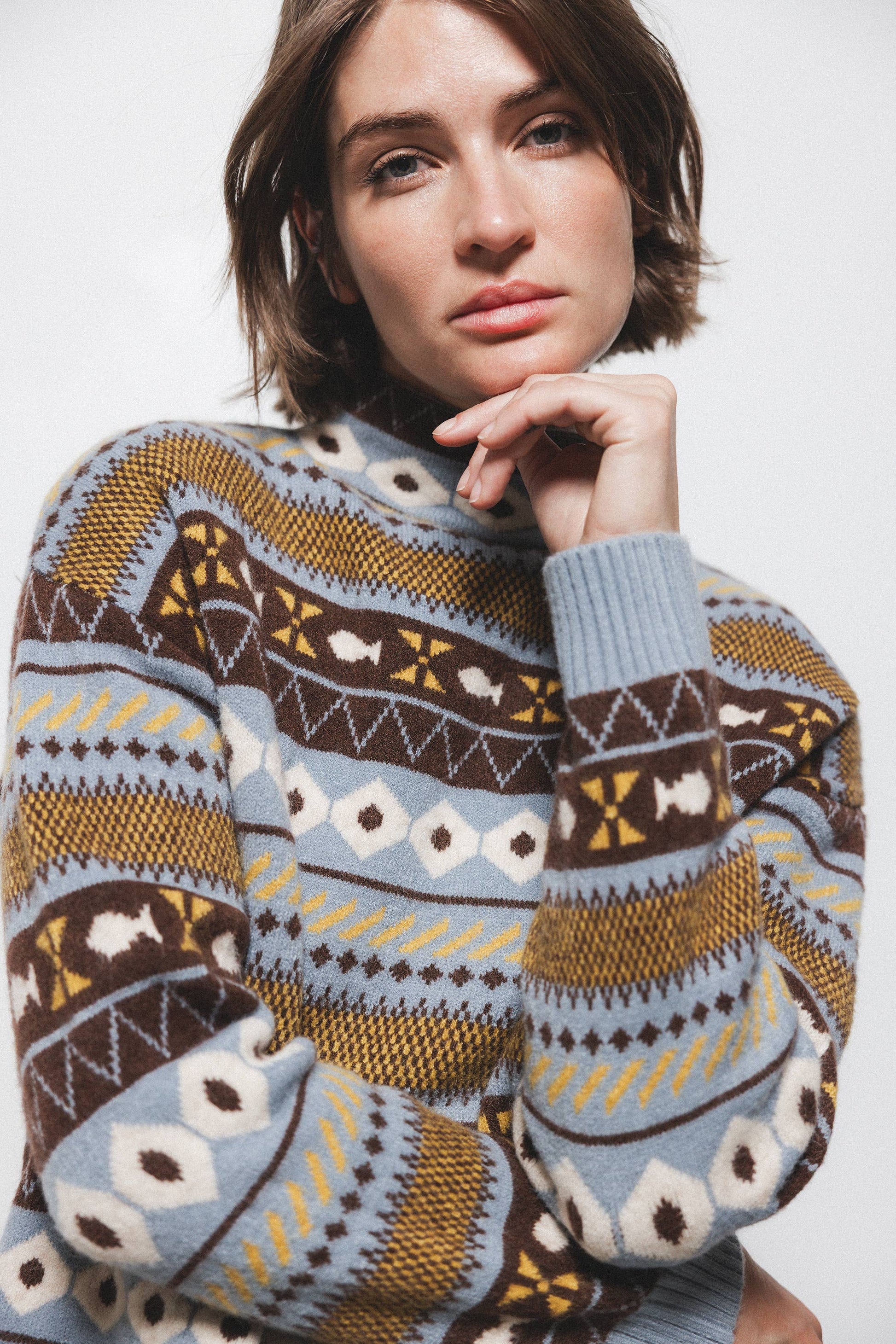 Maglione jacquard a collo alto