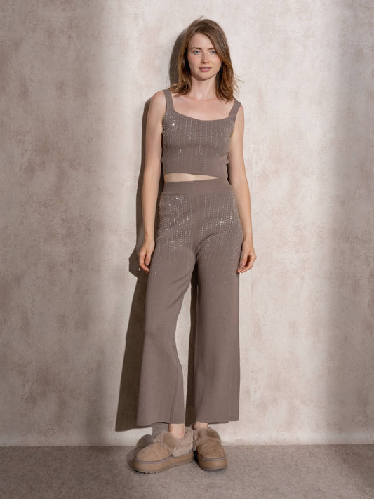 Top cropped in maglia con glitter