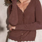 Cardigan in maglia con bottoni dorati