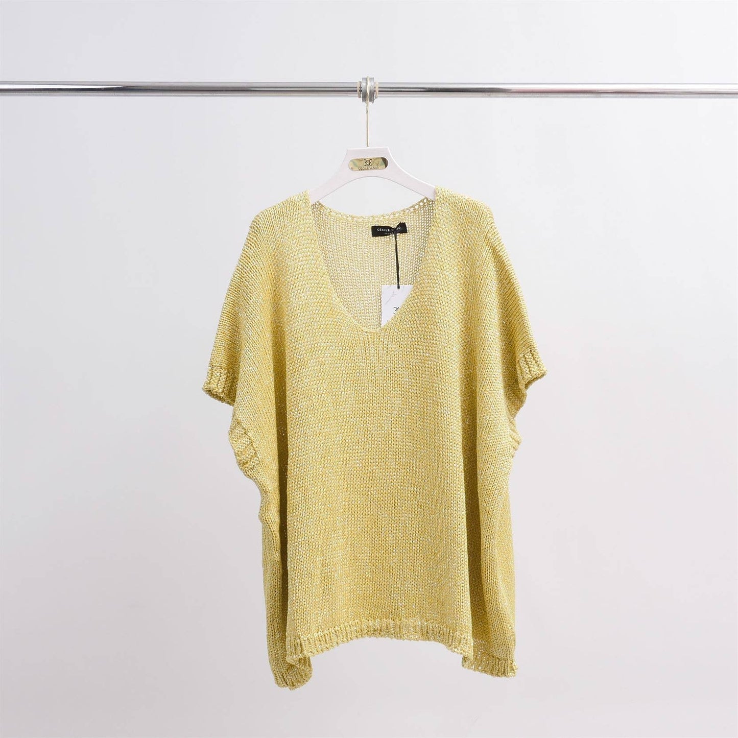 Maglione corto in maglia metallizzata con maniche corte