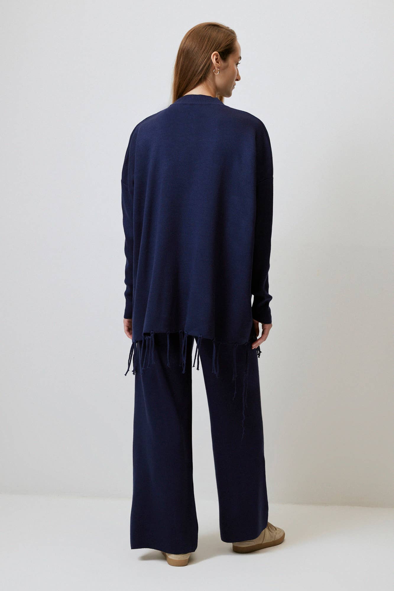 Set maglia e pantaloni con frange