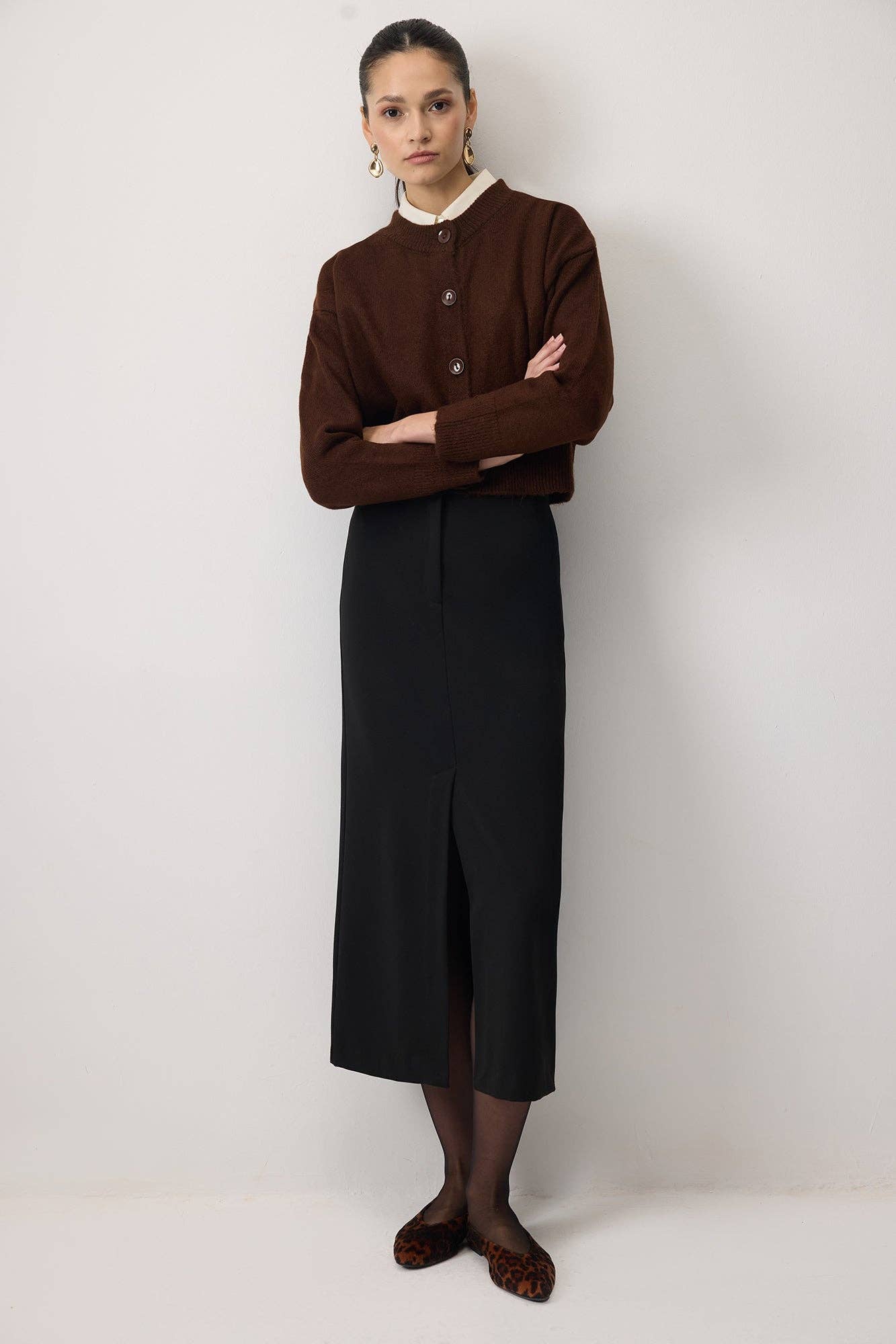 Cardigan corto in maglia con bottoni