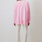 Maglione rosa con collo decorato in perle