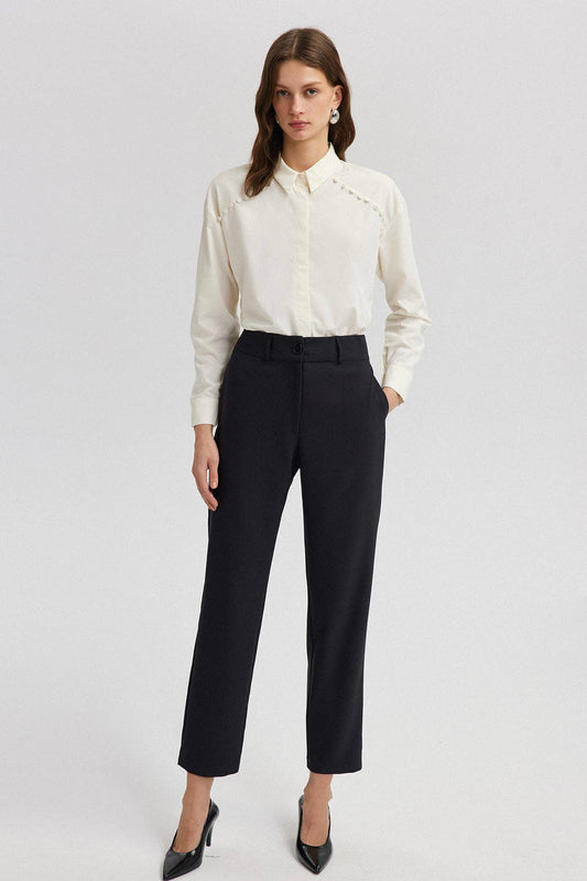 Pantaloni neri a pieghe a vita alta