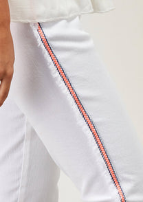 Pantaloni skinny bianchi con banda laterale