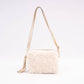 Borsa a tracolla in eco pelliccia con nappa