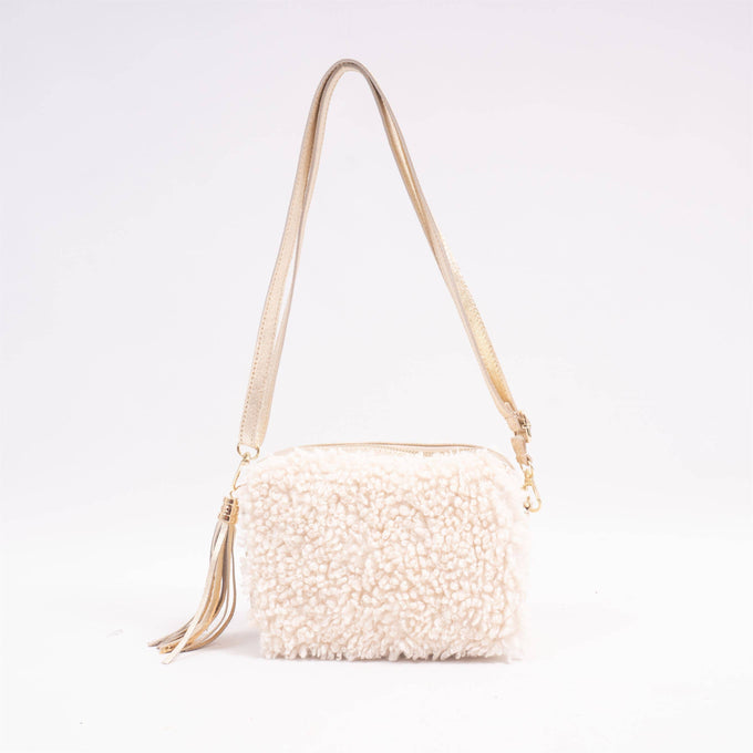 Borsa a tracolla in eco pelliccia con nappa