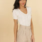 Top in maglia traforata con scollo a V Maki