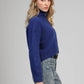 Cardigan cropped blu oltremare a collo alto