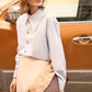 Camicia oversize azzurra con bottoni in metallo