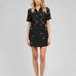 Gonna mini in tweed con strass e perle