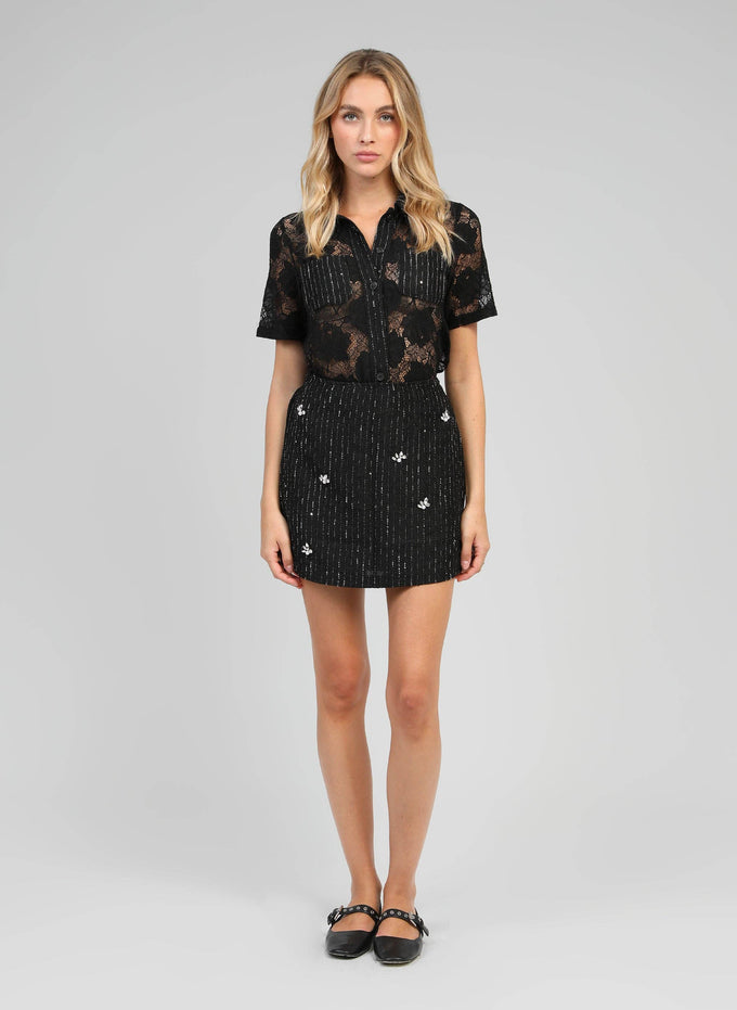 Gonna mini in tweed con strass e perle