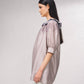 Blusa lunga a pois con scollo a barca e volant