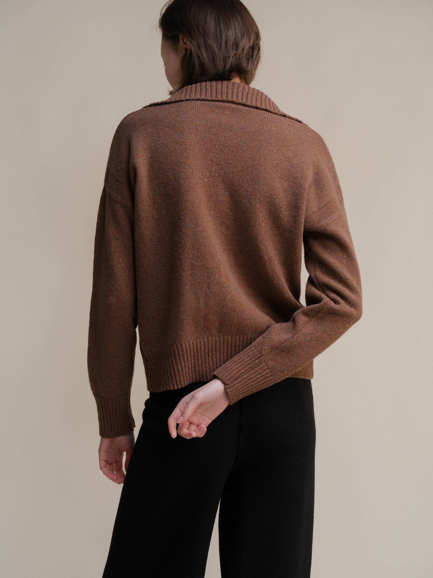 Polo oversize in tweed con tasche