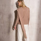 Maglione in maglia con sciarpa abbinata