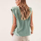 Blusa con spalline strutturate
