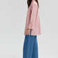 Camicia a righe rosa con polsini larghi