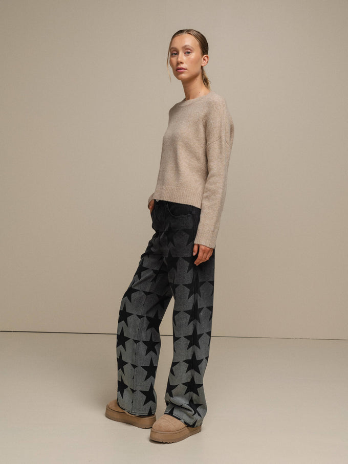 Jeans donna a gamba ampia con stampa stelle