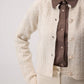 Cardigan in maglia a trecce con bottoni