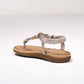 Sandali flat animalier con applicazioni metalliche