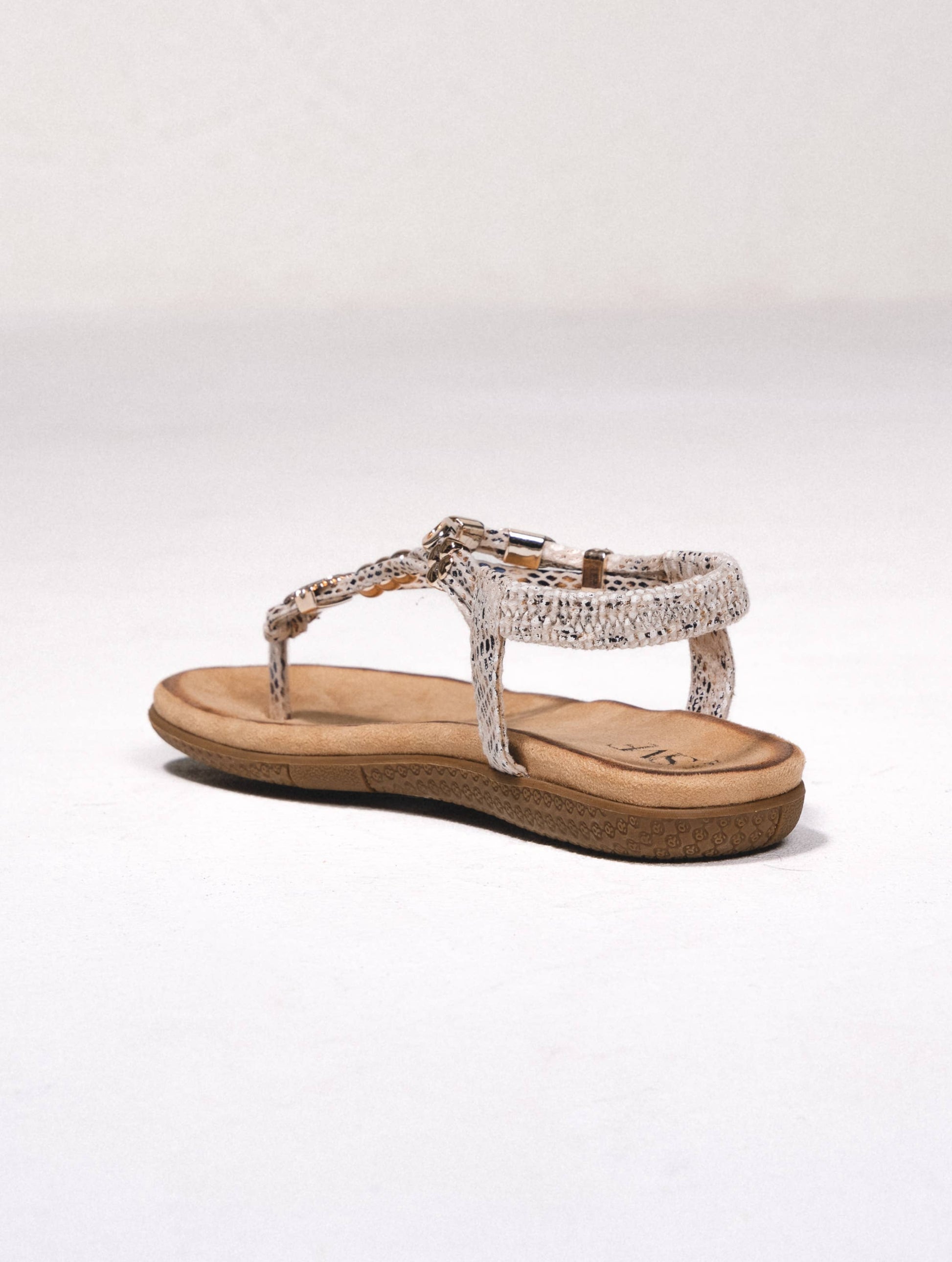 Sandali flat animalier con applicazioni metalliche