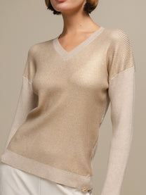 Maglione donna laminato a costine con scollo a V