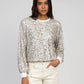 Maglione tricot con paillettes effetto glow