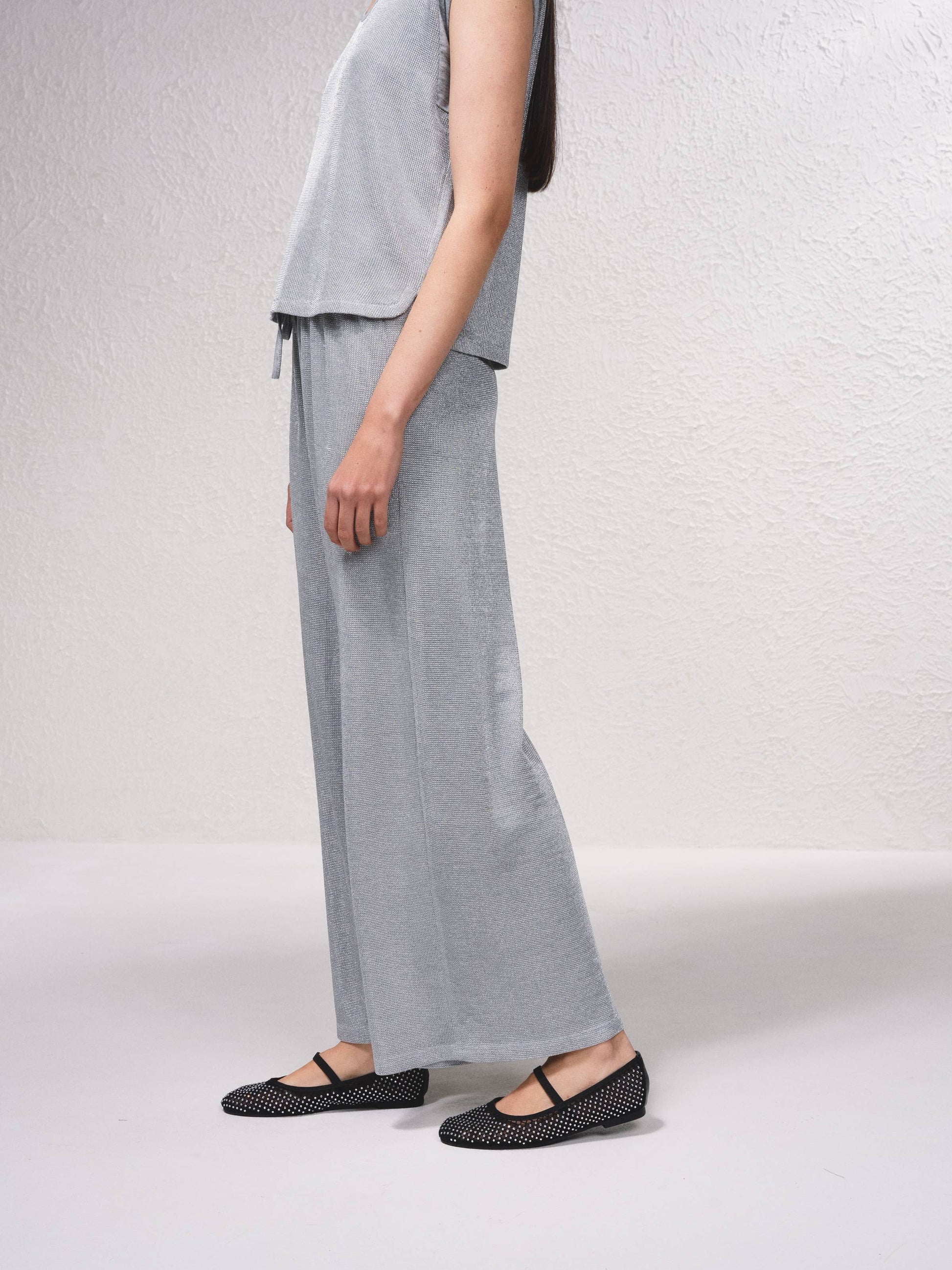 Pantaloni palazzo in lurex con coulisse