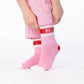 Calzini da tennis rosa a righe con logo