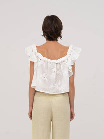 Top bianco Lux con volant e ricami