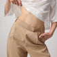 Pantaloni palazzo a vita alta in tessuto fluido