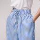 Pantaloni palazzo a righe con vita elasticizzata e laccio