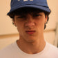 Cappellino snapback blu con toppa
