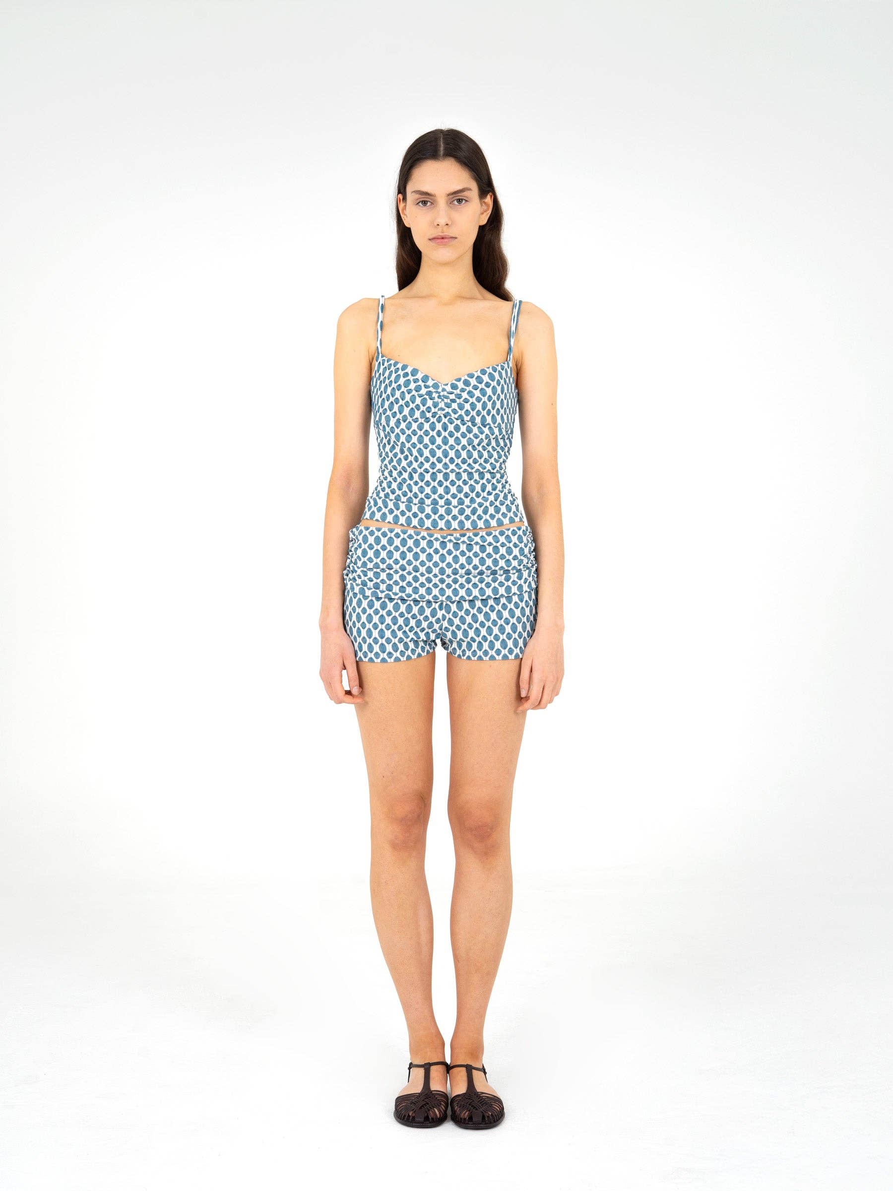 Top arricciato in jersey blu con scollo a cuore