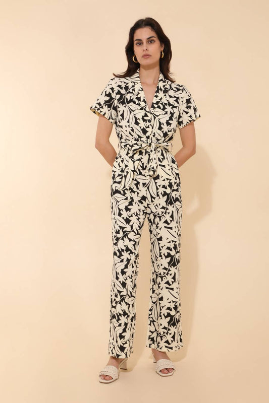 Tuta floreale con scollo a V e cintura