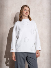 Maglione in maglia con motivo a pois e bottoni ai polsi