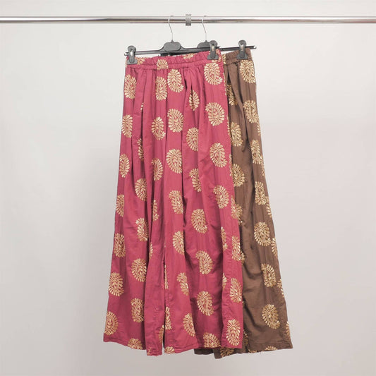 Pantaloni palazzo con ricami floreali