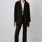 Blazer nero con dettagli metallici