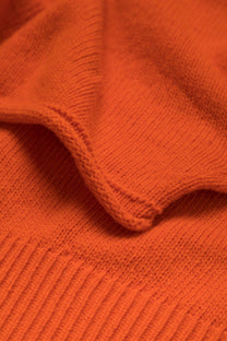Maglione in lana a collo alto con maniche a pipistrello