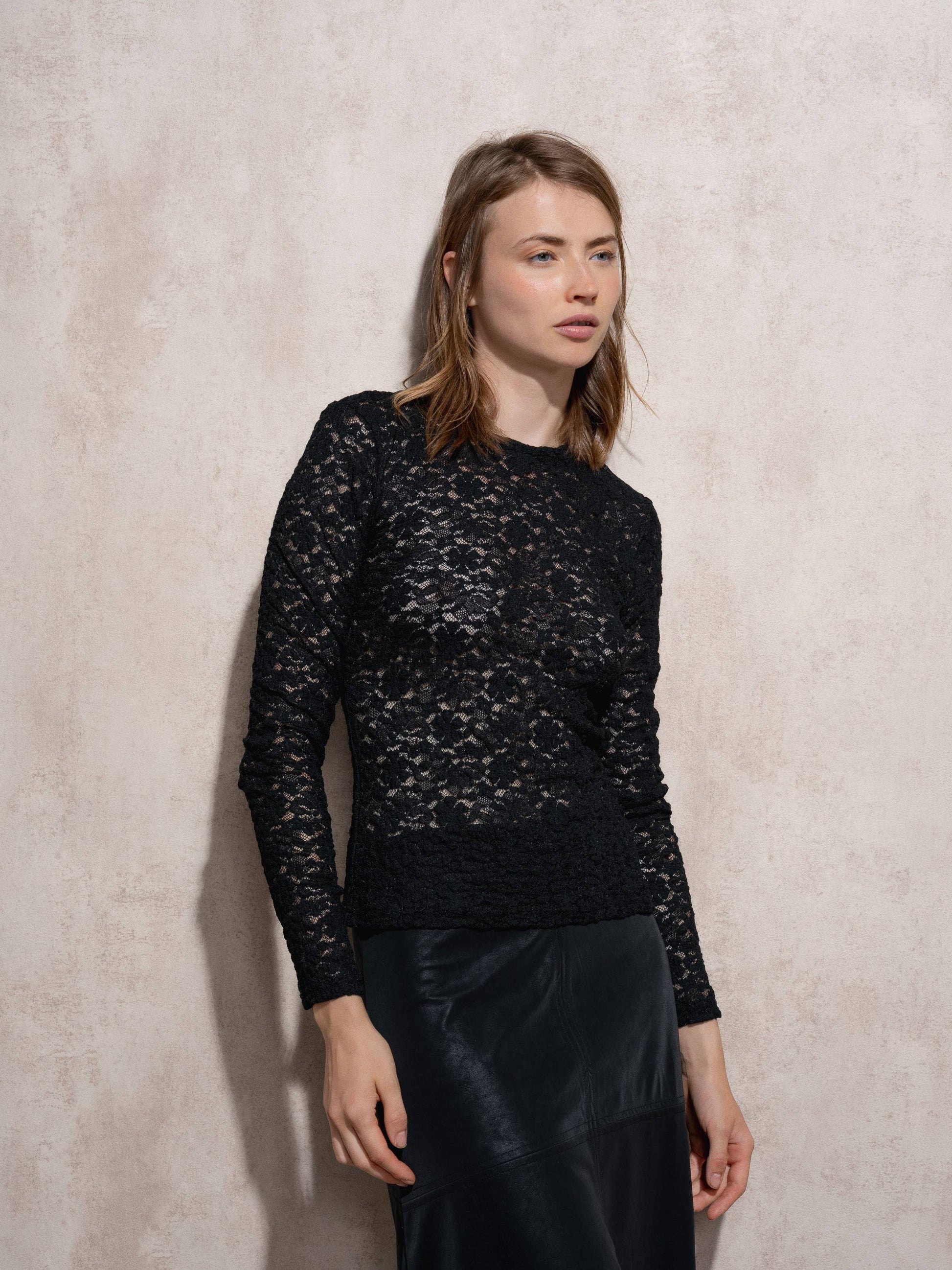Blusa in pizzo elasticizzato