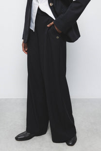 Pantaloni a Gamba Larga con Zip Laterale