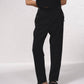 Pantaloni dritti con bottoni decorativi e vita elasticizzata