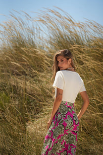 Abito midi con scollo a V e gonna floreale con cintura