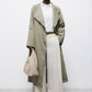 Cappotto lungo con cintura e colletto a rever