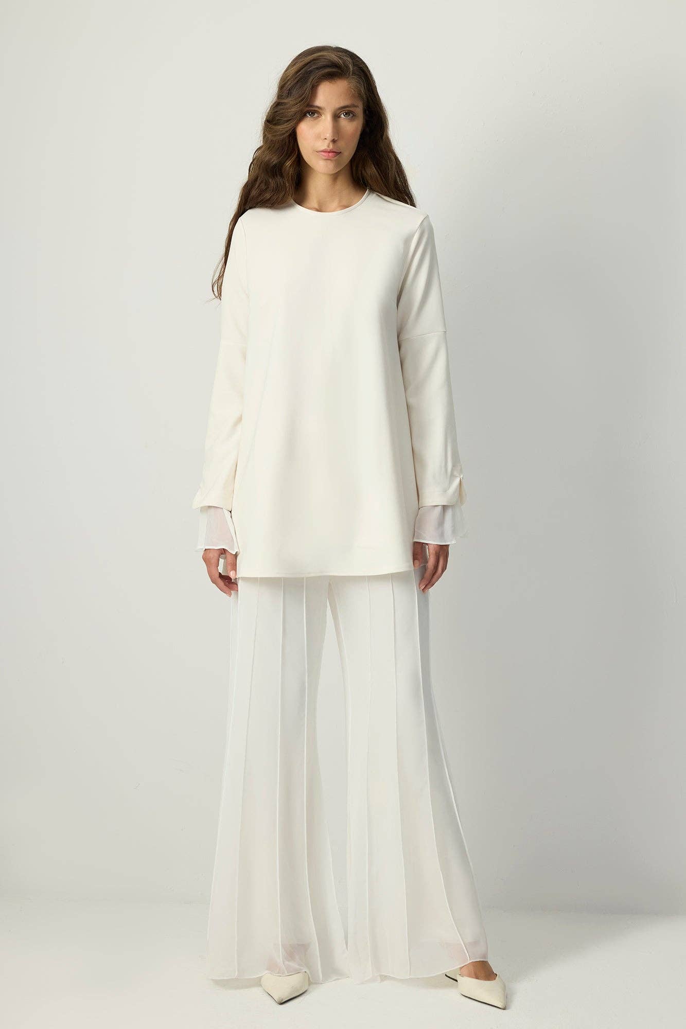 Tunica in crêpe con polsini in chiffon trasparente